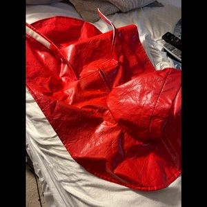 Dog rain slicker with hood red patent up to 25lbs.